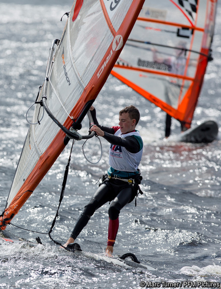 A young windsurfer during a gybe