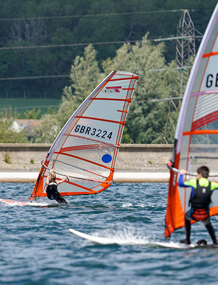 British youth sailing events windsurfing - two young windsurfers competing